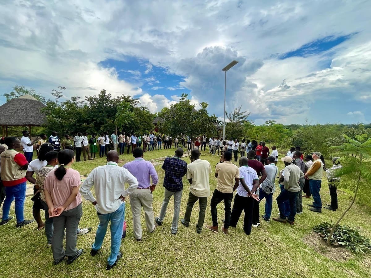 Group of people standing in a circle